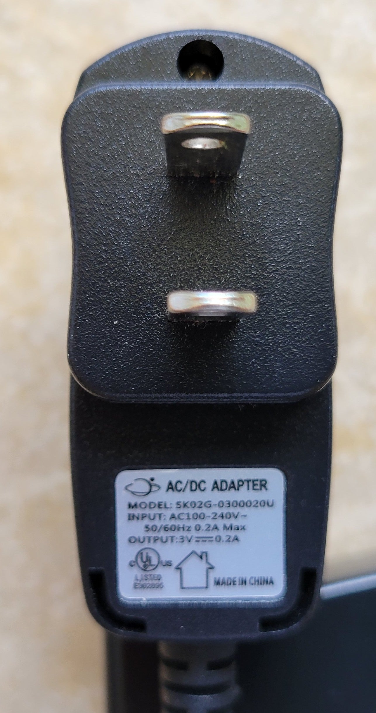 e. AC/DC Adapter, 3V and 0.2A